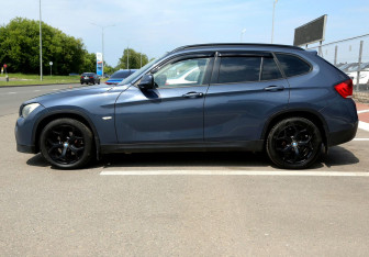 Подержанный автомобиль BMW X1 2012 года (8 фото)