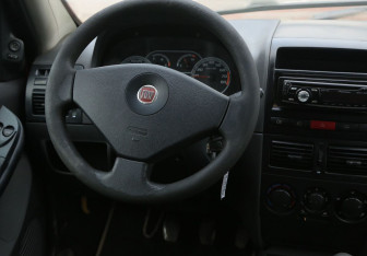 Подержанный автомобиль Fiat Albea 2008 года (14 фото)