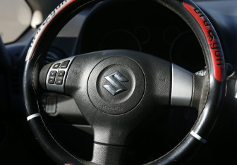 Подержанный автомобиль Suzuki SX4 Hatchback 2010 года (16 фото)