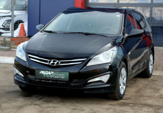 Подержанный автомобиль Hyundai Solaris Hatchback 2014 года (3 фото)