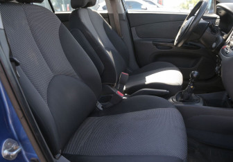 Подержанный автомобиль Kia Rio Hatchback 2011 года (10 фото)