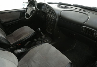 Подержанный автомобиль Chevrolet Niva 2005 года (9 фото)
