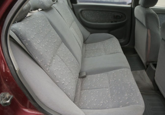 Подержанный автомобиль Kia Spectra Sedan 2008 года (11 фото)