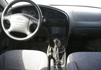 Подержанный автомобиль Kia Spectra Sedan 2007 года (12 фото)