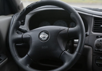 Подержанный автомобиль Nissan Primera Sedan 2001 года (16 фото)