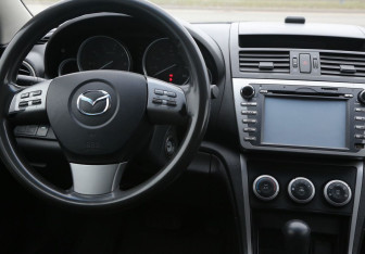Подержанный автомобиль Mazda 6 Sedan 2009 года (14 фото)