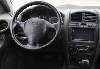 Подержанный автомобиль Hyundai Santa Fe 2008 года (14 фото)