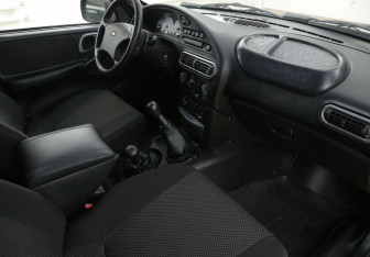 Подержанный автомобиль Chevrolet Niva 2007 года (9 фото)