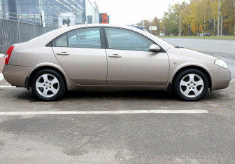 Подержанный автомобиль Nissan Primera Sedan 2004 года (7 фото)