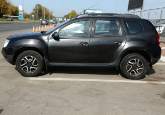 Подержанный автомобиль Renault Duster 2013 года (8 фото)