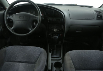 Подержанный автомобиль Kia Spectra Sedan 2006 года (12 фото)