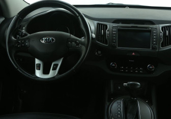Подержанный автомобиль Kia Sportage 2013 года (14 фото)