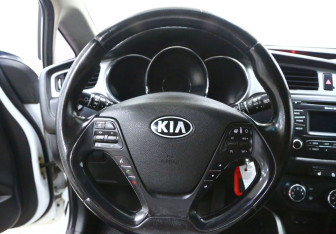 Подержанный автомобиль Kia Ceed Wagon 2014 года (10 фото)