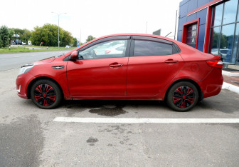 Подержанный автомобиль Kia Rio Sedan 2014 года (8 фото)