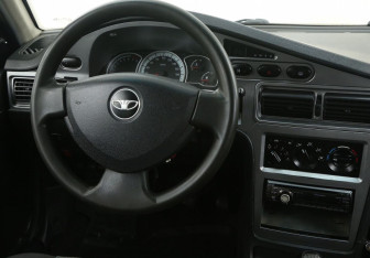 Подержанный автомобиль Daewoo Nexia Sedan 2010 года (14 фото)