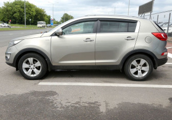 Подержанный автомобиль Kia Sportage 2010 года (8 фото)