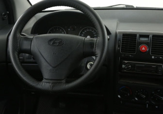 Подержанный автомобиль Hyundai Getz 2008 года (14 фото)