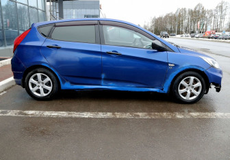 Подержанный автомобиль Hyundai Solaris Hatchback 2011 года (7 фото)