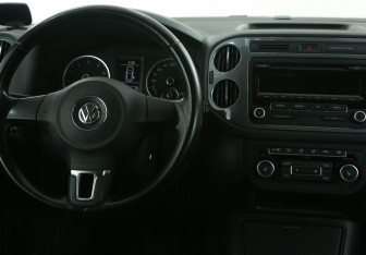 Подержанный автомобиль Volkswagen Tiguan 2014 года (14 фото)