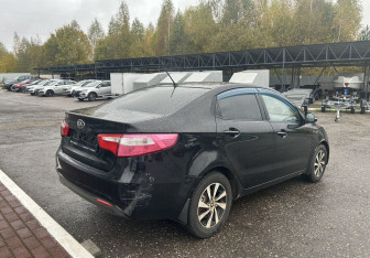 Подержанный автомобиль Kia Rio Sedan 2013 года (7 фото)
