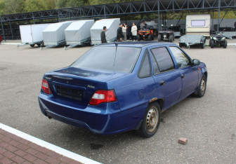 Подержанный автомобиль Daewoo Nexia Sedan 2012 года (7 фото)