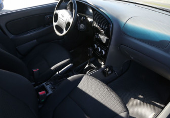 Подержанный автомобиль Kia Spectra Sedan 2007 года (9 фото)