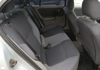 Подержанный автомобиль Nissan Primera Sedan 2001 года (11 фото)