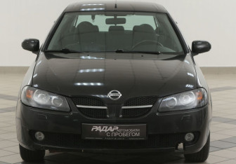 Подержанный автомобиль Nissan Almera Hatchback 2005 года (6 фото)
