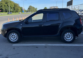 Подержанный автомобиль Renault Duster 2013 года (7 фото)