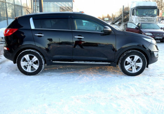 Подержанный автомобиль Kia Sportage 2010 года (7 фото)