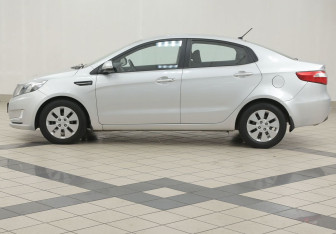 Подержанный автомобиль Kia Rio Sedan 2014 года (7 фото)