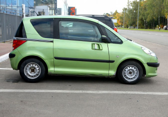 Подержанный автомобиль Peugeot 1007 2006 года (7 фото)