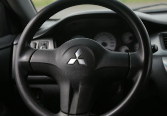 Подержанный автомобиль Mitsubishi Lancer Sedan 2007 года (15 фото)