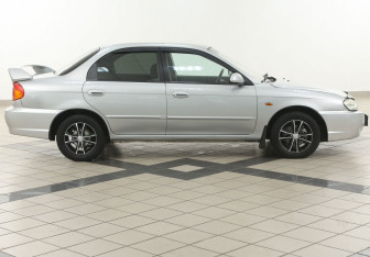 Подержанный автомобиль Kia Spectra Sedan 2008 года (5 фото)