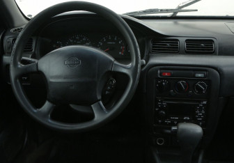 Подержанный автомобиль Nissan Sentra Sedan 1999 года (14 фото)