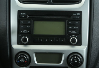 Подержанный автомобиль Kia Sportage 2010 года (13 фото)