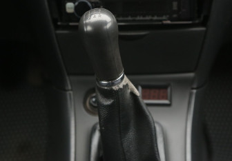 Подержанный автомобиль Toyota Corolla Sedan 2003 года (13 фото)