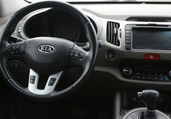 Подержанный автомобиль Kia Sportage 2010 года (14 фото)