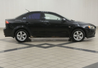 Подержанный автомобиль Mitsubishi Lancer Sedan 2008 года (5 фото)