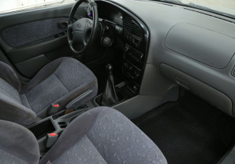 Подержанный автомобиль Kia Spectra Sedan 2007 года (9 фото)