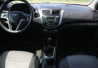 Подержанный автомобиль Hyundai Solaris Sedan 2013 года (12 фото)