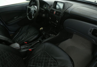 Подержанный автомобиль Nissan Almera Sedan 2006 года (9 фото)