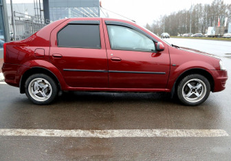 Подержанный автомобиль Renault Logan Sedan 2013 года (7 фото)