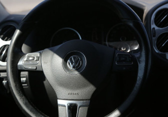 Подержанный автомобиль Volkswagen Tiguan 2014 года (18 фото)