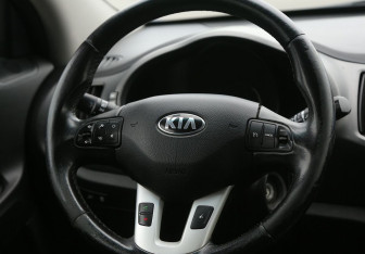 Подержанный автомобиль Kia Sportage 2013 года (19 фото)