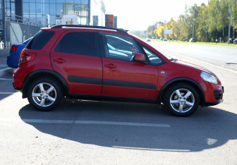 Подержанный автомобиль Suzuki SX4 Hatchback 2010 года (7 фото)