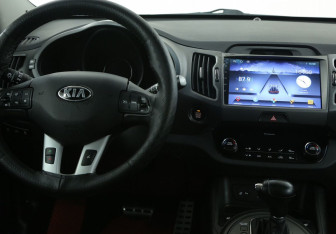 Подержанный автомобиль Kia Sportage 2013 года (14 фото)