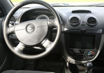 Подержанный автомобиль Chevrolet Lacetti Hatchback 2006 года (15 фото)