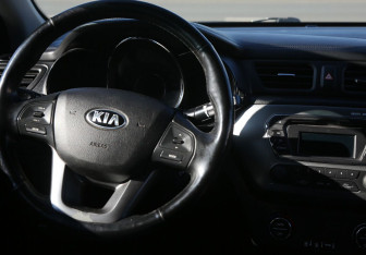 Подержанный автомобиль Kia Rio Sedan 2013 года (14 фото)