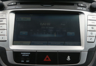 Подержанный автомобиль Hyundai ix35 2013 года (15 фото)